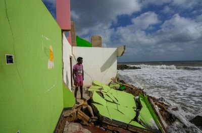 AP PHOTOS: In Sri Lanka, fishers suffer as sea erosion destroys homes and beaches