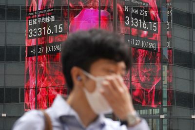 Stock market today: Asian shares sink as central banks crank interest rates still higher