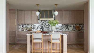 European elegance and organic materials create a luxe look in a Chicago high-rise – the kitchen is one of the best we've seen