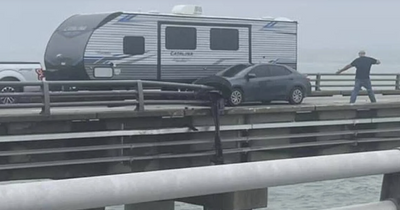 Officials search for driver who plunged off Chesapeake Bay Bridge-Tunnel into river