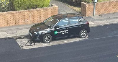 Scots residents stunned as road resurfacing workers tarmac around parked car
