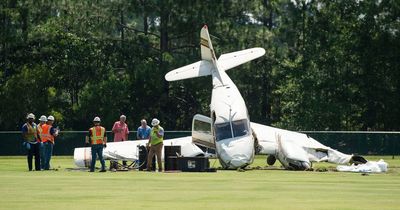 Plane crashes onto school field after taking off from airport less than a mile away