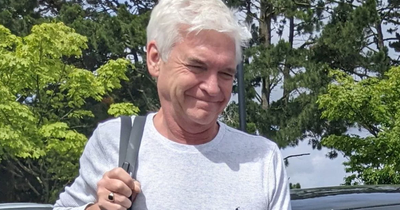 Phillip Schofield spotted looking 'very tired' as Holly parties at Glastonbury