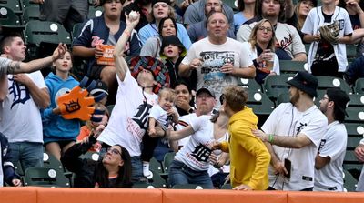 Double Dad Duty: MLB Fan Makes One-Handed Snag on Home Run Ball While Holding Baby