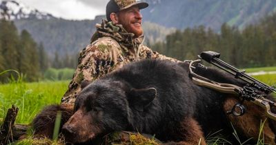 NFL free agent Carson Wentz causes outrage by posing with bear he killed