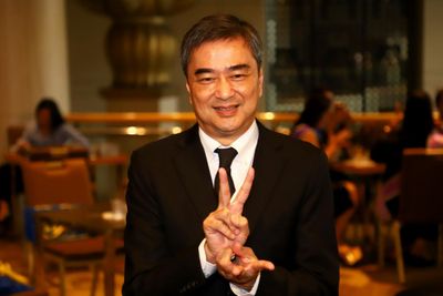 Abhisit tight-lipped about return