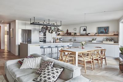 Should your kitchen and living room match? Designers agree on the best way to decorate an open plan space