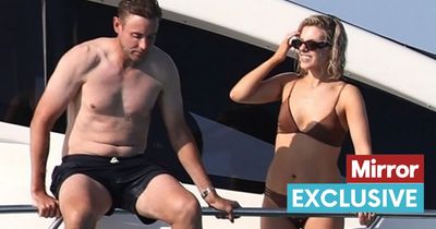 Mollie King and cricketer Stuart Broad look loved-up as they jump off a luxury yacht