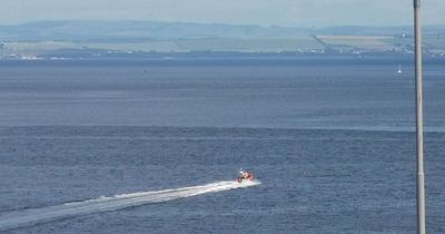 Edinburgh woman and children rescued by paddleboarder as lifeboat races to beach