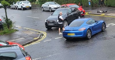 Edinburgh Porsche driver involved in collision at busy junction as traffic backed up