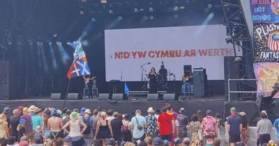 Gwenno appears on Glastonbury stage with huge 'Wales is not for sale' sign