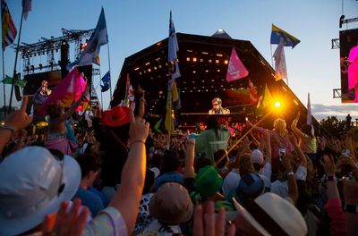 Rocketmen, ravers and relief from the sun: Sunday at Glastonbury – photo essay
