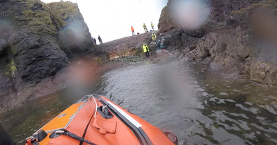 Boy falls 15ft from rocks at Scots harbour sparking RNLI rescue mission