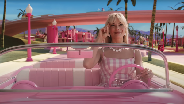 Margot Robbie goes full Barbie for movie photocall, but co-stars miss the  memo