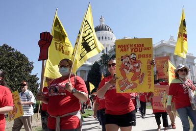 California's law aimed at fast food wages is on hold. Lawmakers may have found a way around it
