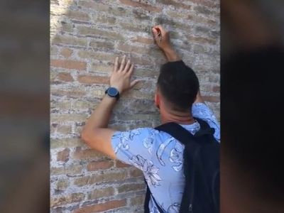 Outrage in Italy after tourist filmed carving his and girlfriend’s names into Rome’s Colosseum