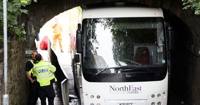 Road and rail disruption as bus gets stuck under Metro bridge in Gateshead