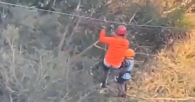 Moment before child plunges 10 metres from zip line into lake - and survives