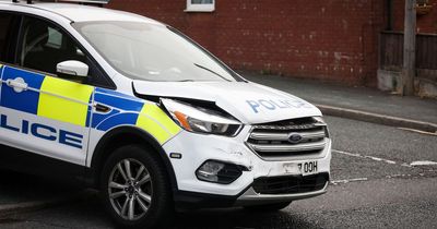 Police vehicle damaged after crash with car in Rochdale