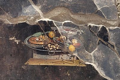 ‘World’s oldest pizza’ unearthed in 2000 year-old painting of ‘distant ancestor’