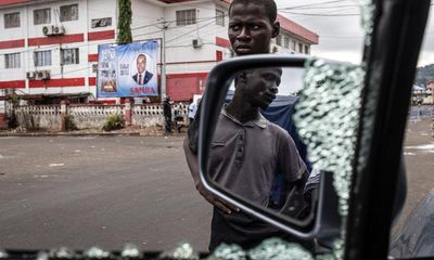 Woman killed at opposition party HQ during Sierra Leone elections