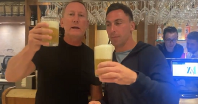 Celtic hero Scott Brown downs drink with Ray Parlour as he toasts Ally McCoist and Alan Brazil