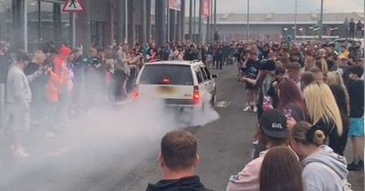 West Lothian retail park taken over as huge crowds watch drivers pull car stunts