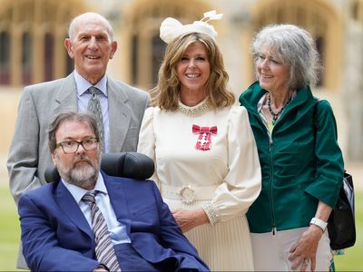 Derek Draper watches as wife Kate Garraway collects MBE from William