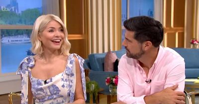 Holly Willoughby blushes and brushes off questions about husband in red-faced This Morning moment