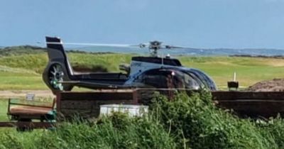 'UK’s richest gypsy' lands at seaside golf course in signature £4m ‘G-YPSE’ helicopter