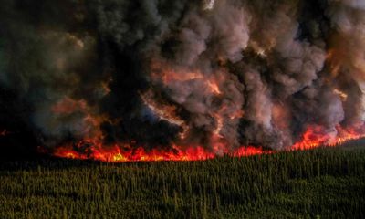 ‘It burns wild and free up there’: Canada fires force US crews to shift strategy