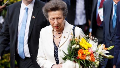 Princess Anne takes style tips from Kate Middleton with smart cream blazer and royal blue dress during trip to Germany
