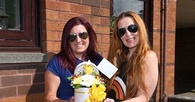 Lifelong friend shows appreciation for Fiona with flowers to brighten up her day