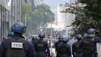 France braces for another night of unrest as policeman charged with killing teen