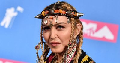 Madonna 'battled unreported fever for a month' before hospitalisation