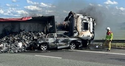 Man 'seriously injured' after crash between lorry and car with both bursting into flames