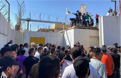 Protesters briefly storm the Swedish Embassy in Baghdad in protest over Quran burning