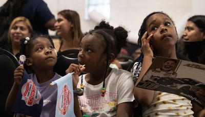 Hundreds of kids get free NASCAR tickets at West Side community event
