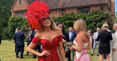 Lizzie Cundy oozes glamour in stunning red outfit at friend's wedding