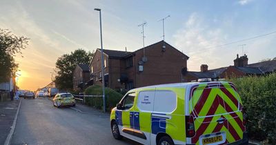 House taped off as two men taken to hospital after attack 'with weapons'