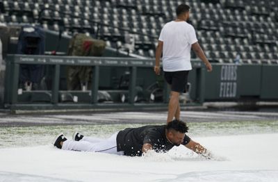 14 photos of Coors Field absolutely covered in hail before Rockies – Dodgers