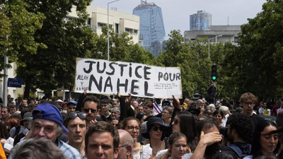 875 arrested and 200 police officers hurt on France's 3rd night of protests over teen's killing: Key points