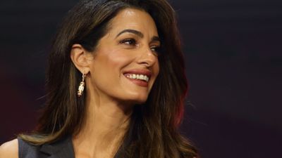 We can't get over how chic Amal Clooney's yellow jumpsuit is