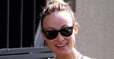 Olivia Wilde shows off toned abs as rumours of new Harry Styles romance swirl