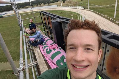 Animal Rising activists scale race track scaffold ahead of Greyhound Derby Final