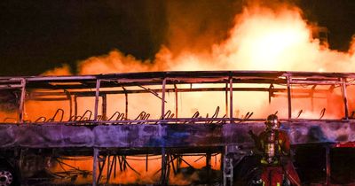 Gunman opens fire on police and weapon shop looted during escalating riots across France