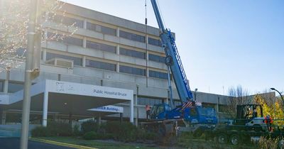 Watch as Calvary Hospital crosses come down ahead of takeover