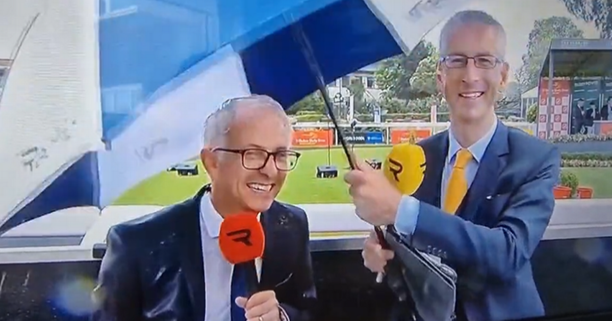 Irish TV presenters battle the weather live on air as…