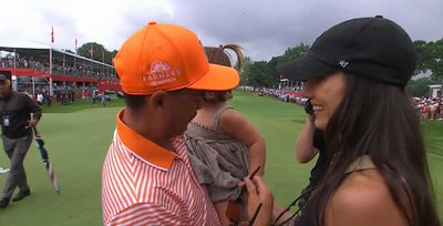 Rickie Fowler had a beautiful celebration with his wife and daughter after his Rocket Mortgage Classic win