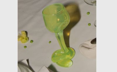 Lime-green glassware by Completedworks appears to melt at the table